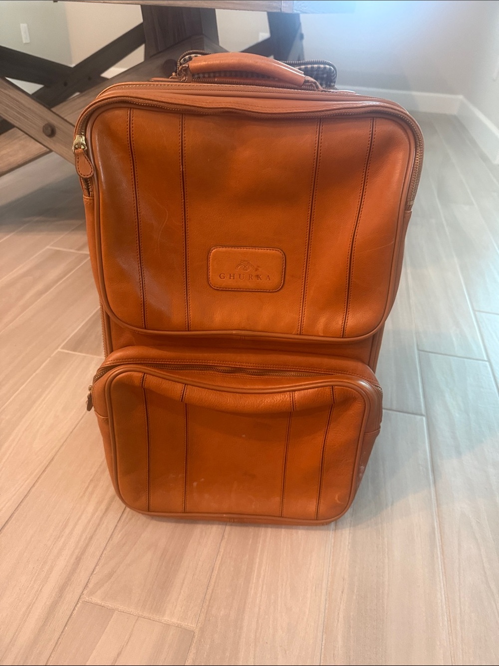 Ghurka Leather Rolling Carry-On in Cognac